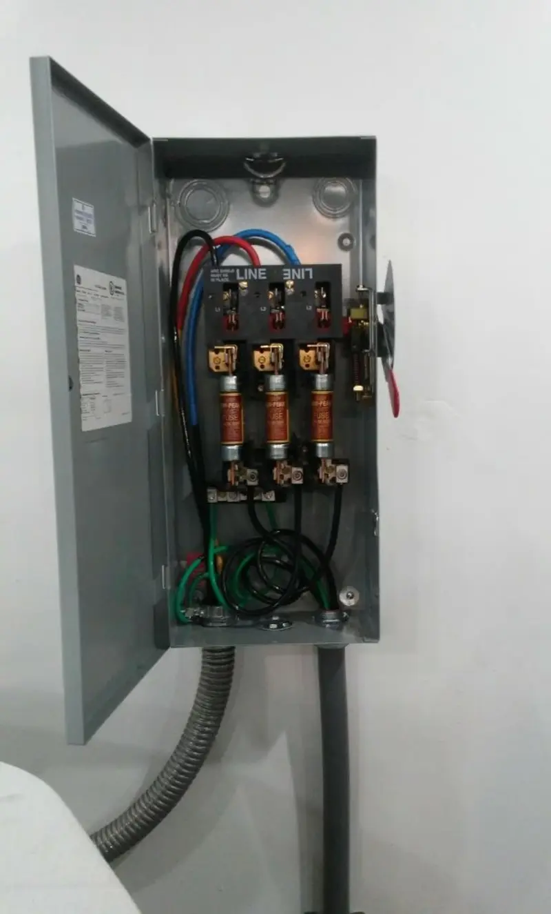 Three-phase disconnect switch installed for Smoke Detector Installation in Farr West